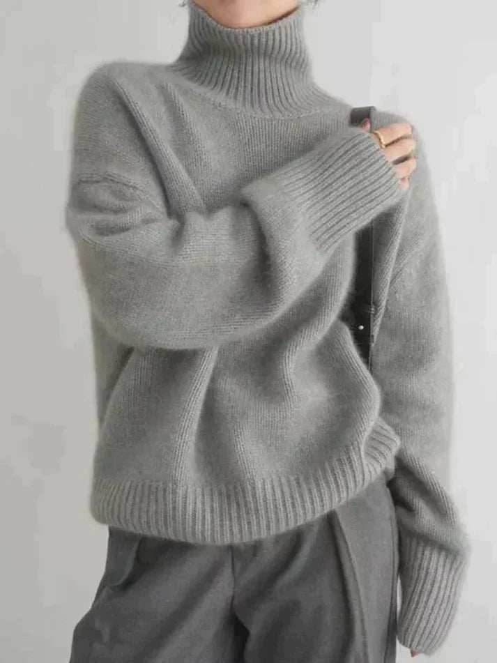 TS | Minimalist knitted sweater with a high neckline