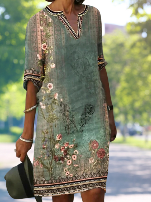 LD | Groene midi-jurk met V-hals en bloemenpatroon