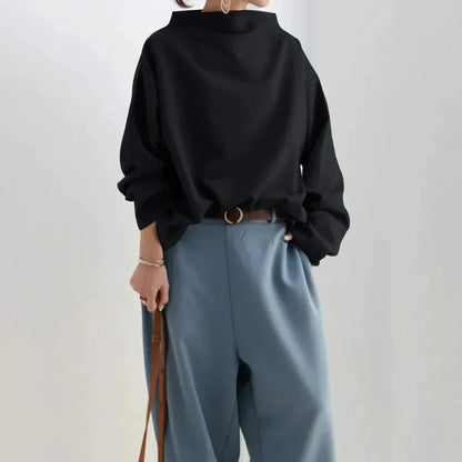 TS | Black jumper with oversized round neckline